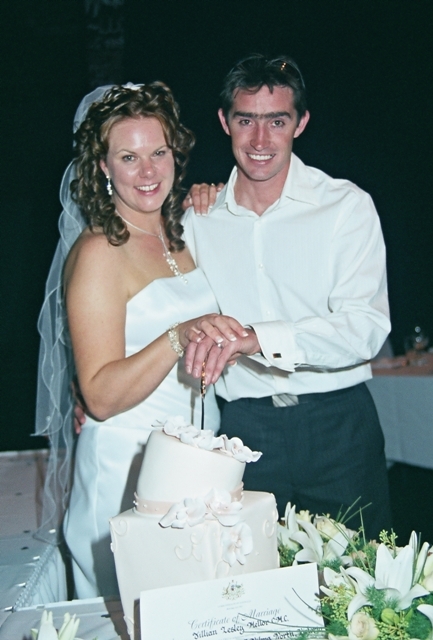 Cutting the Wedding cake with Brett & Melanie