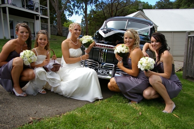 Wedding Photographer:  Bridal Party photography.features the wedding vehicle