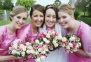 Bridesmaids pretty in pink, with bouquets to match the Bride in white!