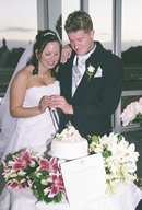 Cutting the Wedding cake with Sam & Sheree....