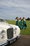 Wedding transport & happy bridesmaids