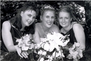 A b/w post-wedding photo:  The Bride & her attendants